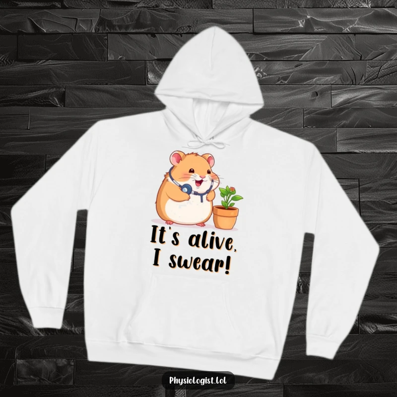 Funny hoodie design of a chubby hamster wearing a stethoscope, playfully listening to the leaves of a small green potted plant with serious concentration.