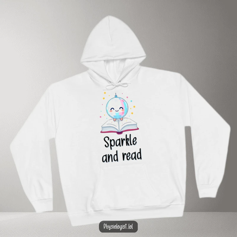 Funny hoodie featuring a vibrant disco ball creating a magical glitter shower over a beloved book, ideal for cozy reading sessions.