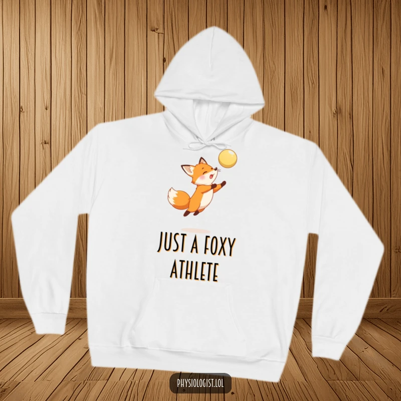 Funny Fox Hoodie: Cozy apparel featuring a jumping fox artistically rendered, mid-action to hit a ball, exuding playful energy.