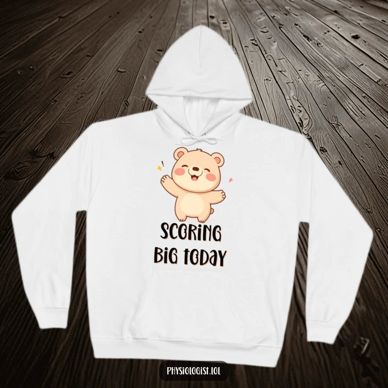 Funny Bear Hoodie: A giggling bear executes a triumphant flourish after a score, symbolizing celebration and cozy warmth.