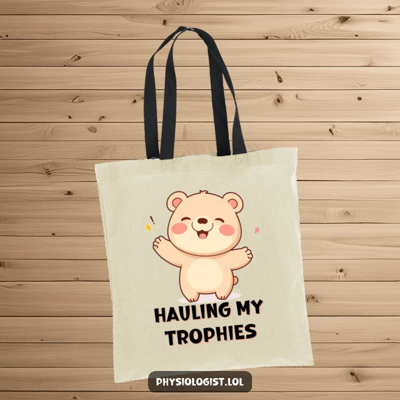 Funny Bear Tote Bag: A giggling bear celebrating a score with a flourish, perfect for carrying essentials with pride.